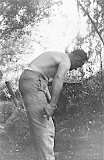 Fritz digging fishing worms.